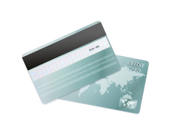 Photo of Grey plastic credit cards on white background