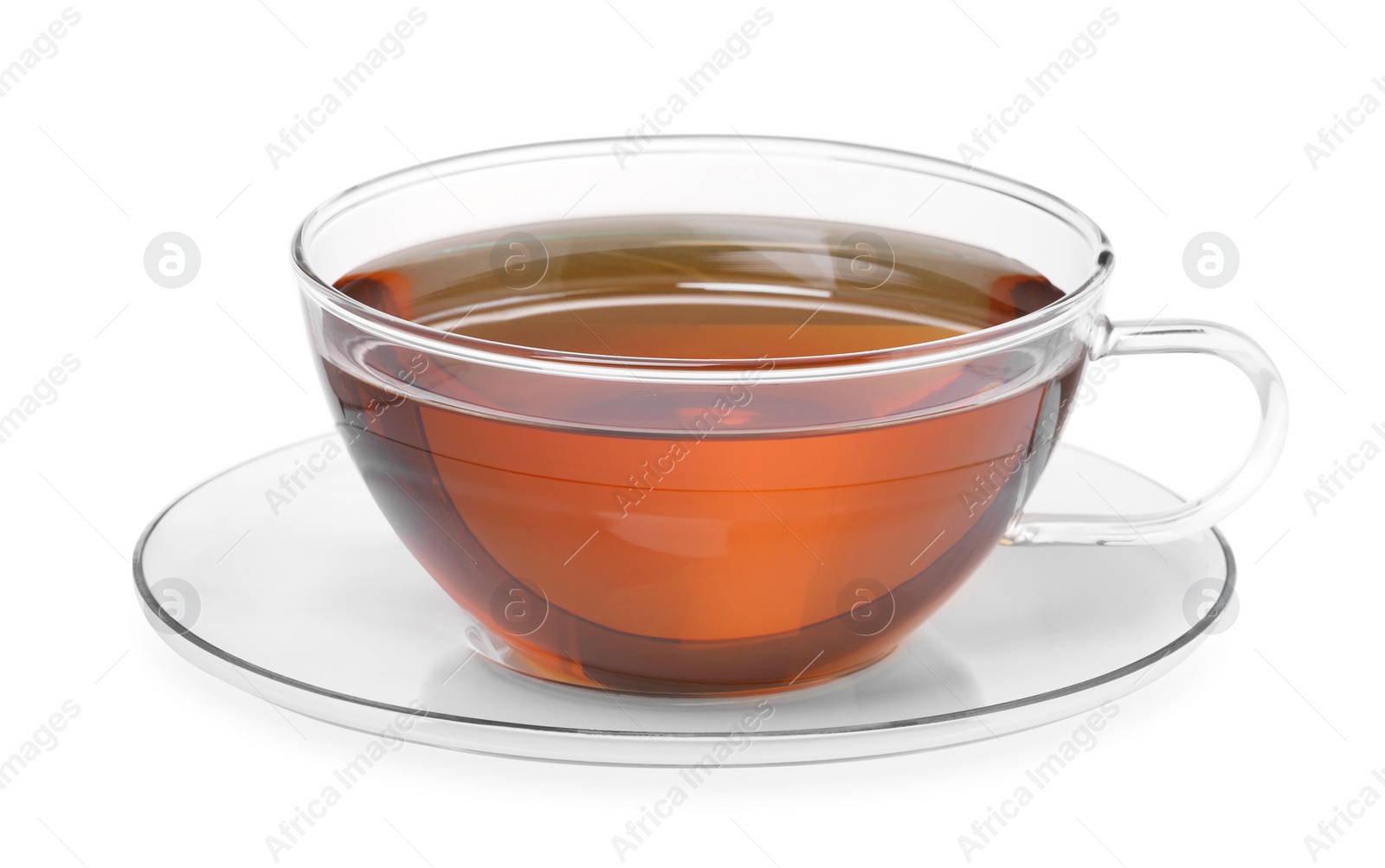 Photo of Glass cup of tea and saucer isolated on white