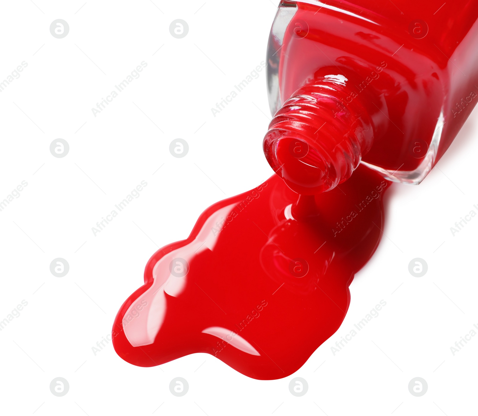 Photo of Spilled color nail polish with bottle on white background