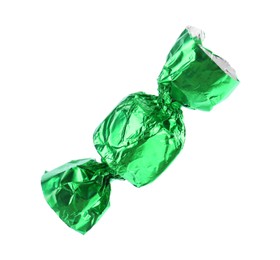 Photo of Tasty candy in green wrapper isolated on white