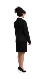 Young businesswoman in suit standing on white background