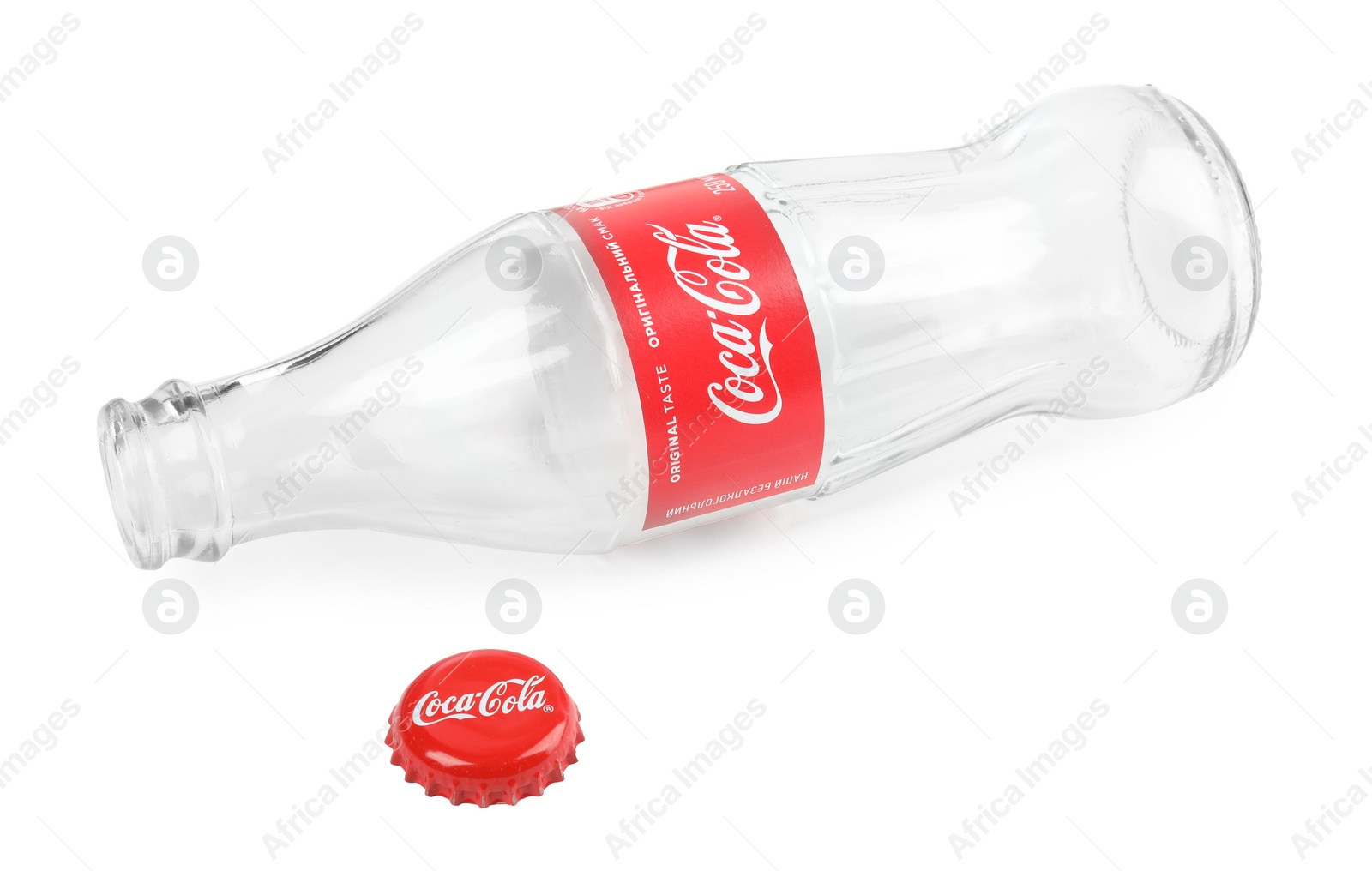 Photo of MYKOLAIV, UKRAINE - NOVEMBER 15, 2018: Coca Cola bottle and lid on white background