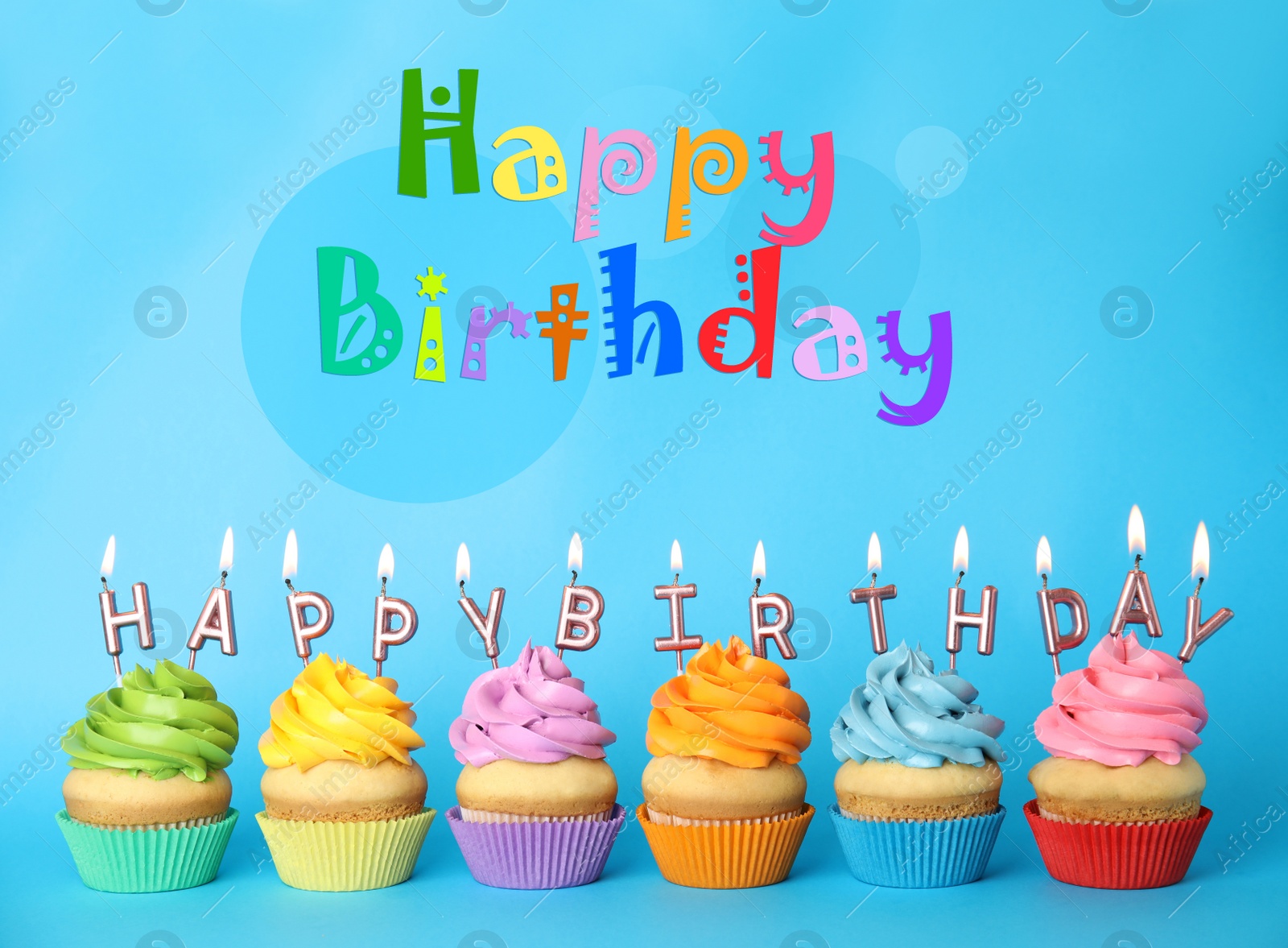 Image of Text Happy Birthday and delicious cupcakes with burning candles on light blue background