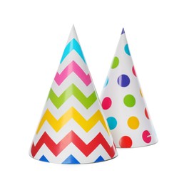 Photo of Colorful party hats on white background. Festive items