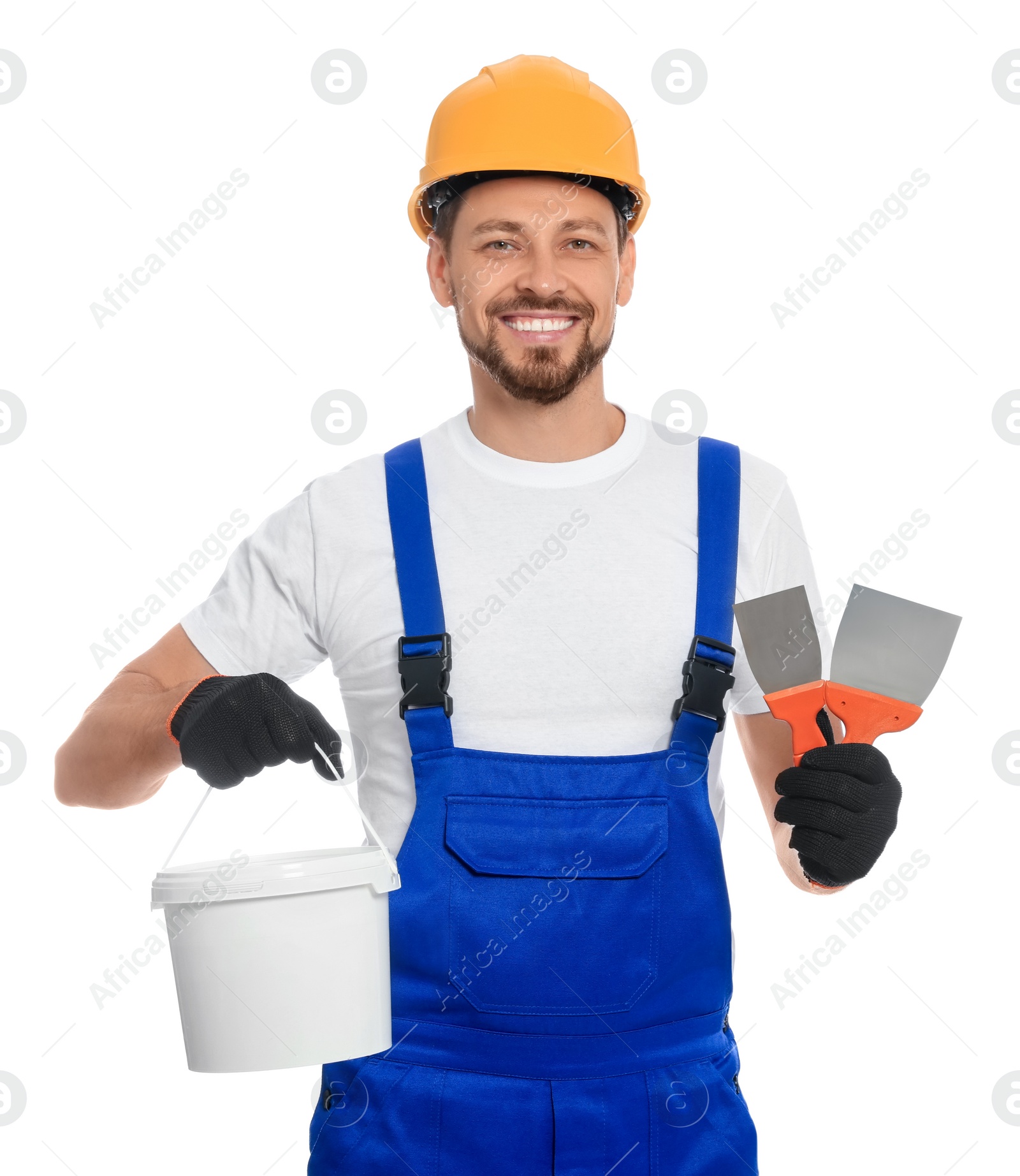 Photo of Professional worker with putty knife and plaster in hard hat on white background
