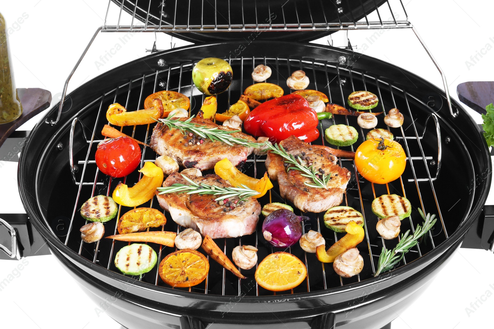 Photo of Modern barbecue grill with tasty food on white background