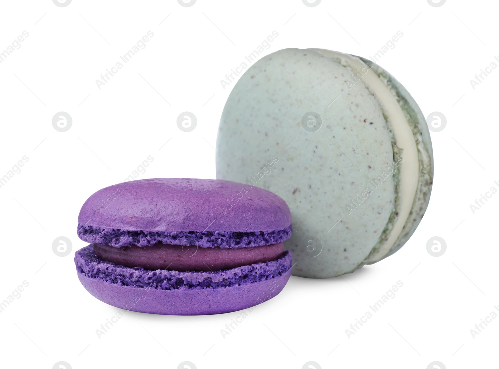 Photo of Different delicious colorful macarons on white background