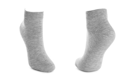Pair of light grey socks isolated on white