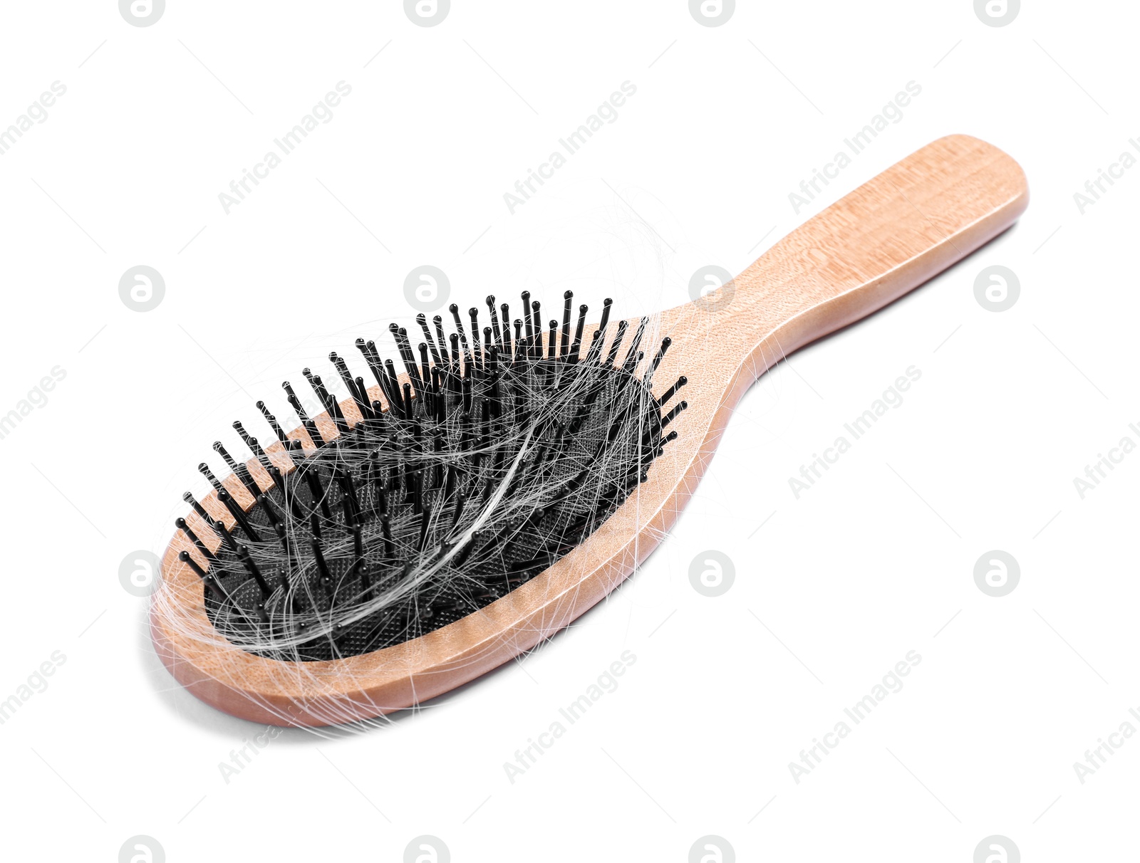 Photo of Brush with lost hair isolated on white