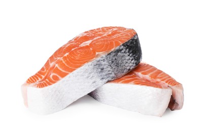 Photo of Fresh raw salmon steaks on white background