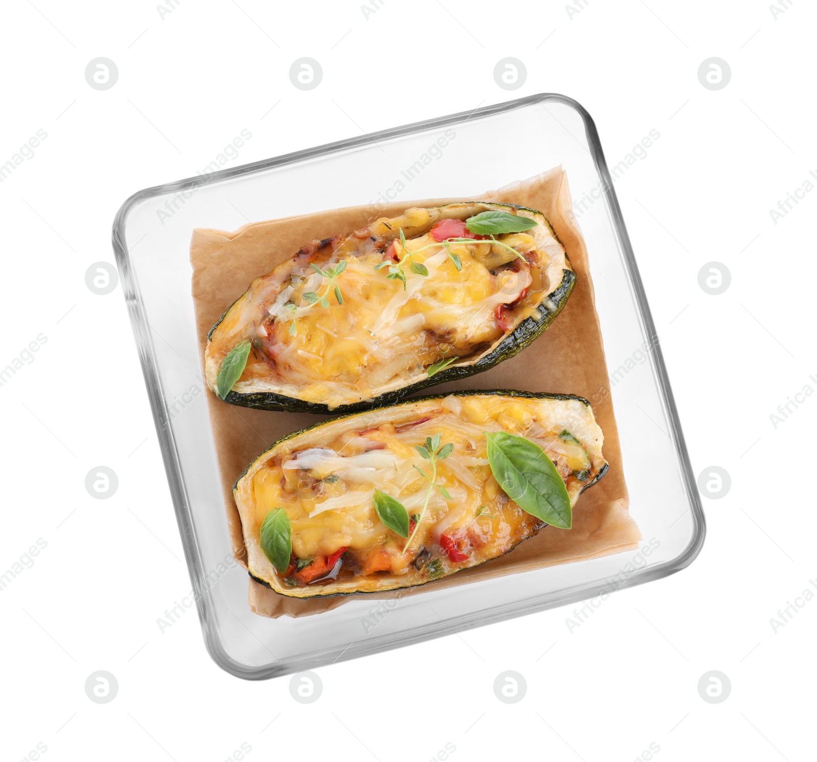 Photo of Baked stuffed zucchini on white background, top view