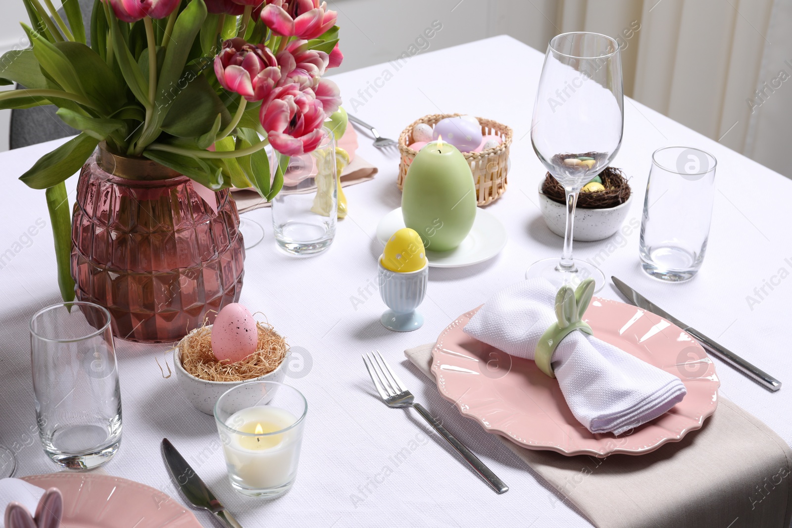 Photo of Festive table setting with beautiful flowers. Easter celebration