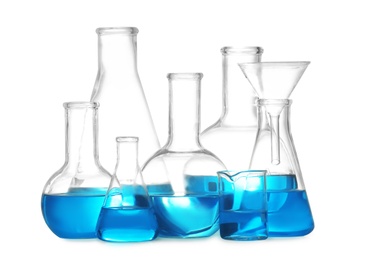 Laboratory glassware with liquid on white background. Solution chemistry