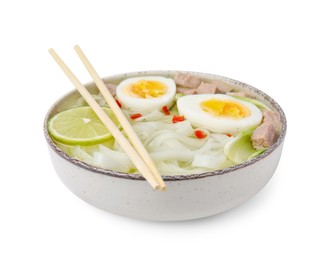 Photo of Bowl of delicious rice noodle soup with meat and egg isolated on white