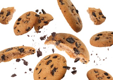 Image of Tasty chocolate chip cookies falling on white background