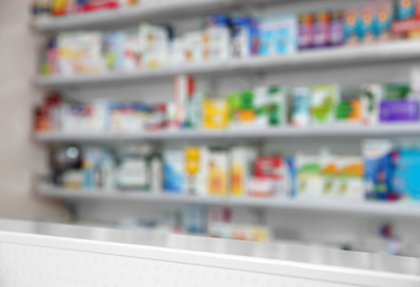 Blurred view of modern pharmacy interior with different medicine