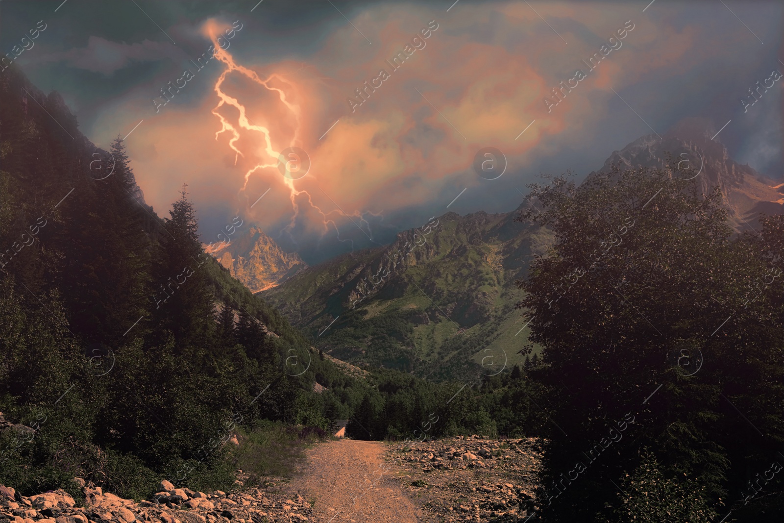 Image of Dark cloudy sky with lightnings over beautiful trees and mountains. Thunderstorm