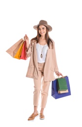 Photo of Young woman with shopping bags on white background