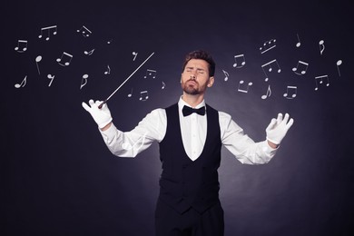 Image of Conductor with baton and music notes on dark background