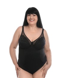 Photo of Beautiful overweight woman in black underwear on white background. Plus-size model