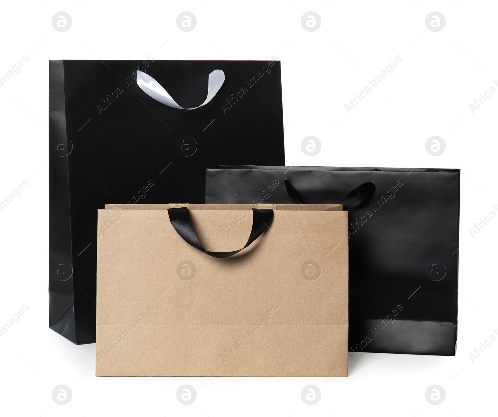 Photo of Paper shopping bags isolated on white. Mock up for design