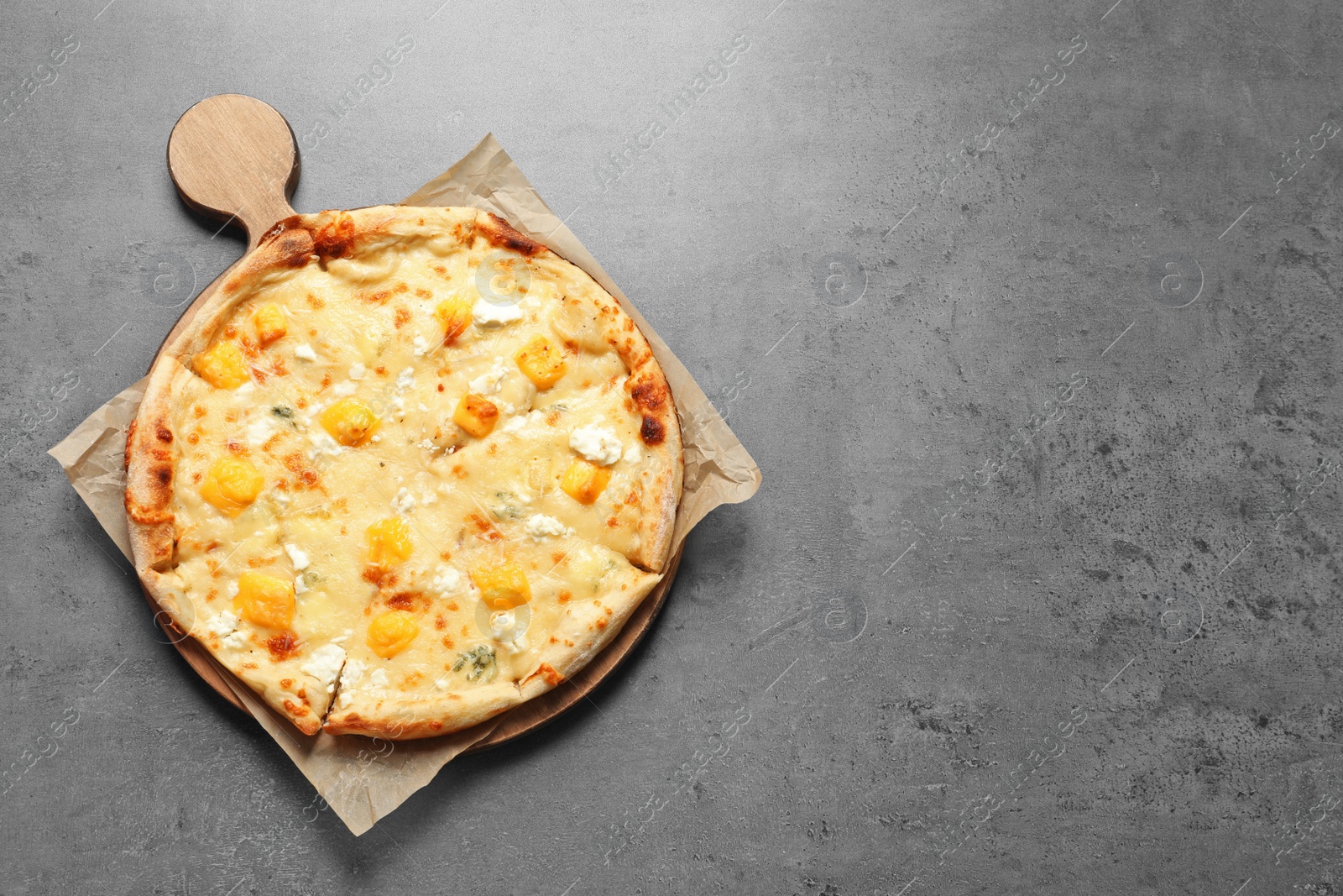 Photo of Hot cheese pizza Margherita on grey background, top view. Space for text