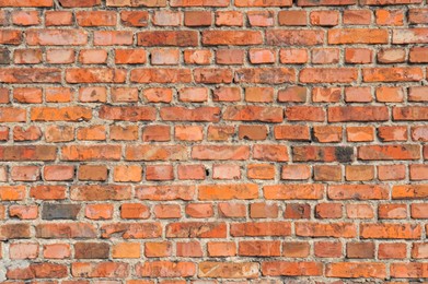 Photo of Texture of old red brick wall as background