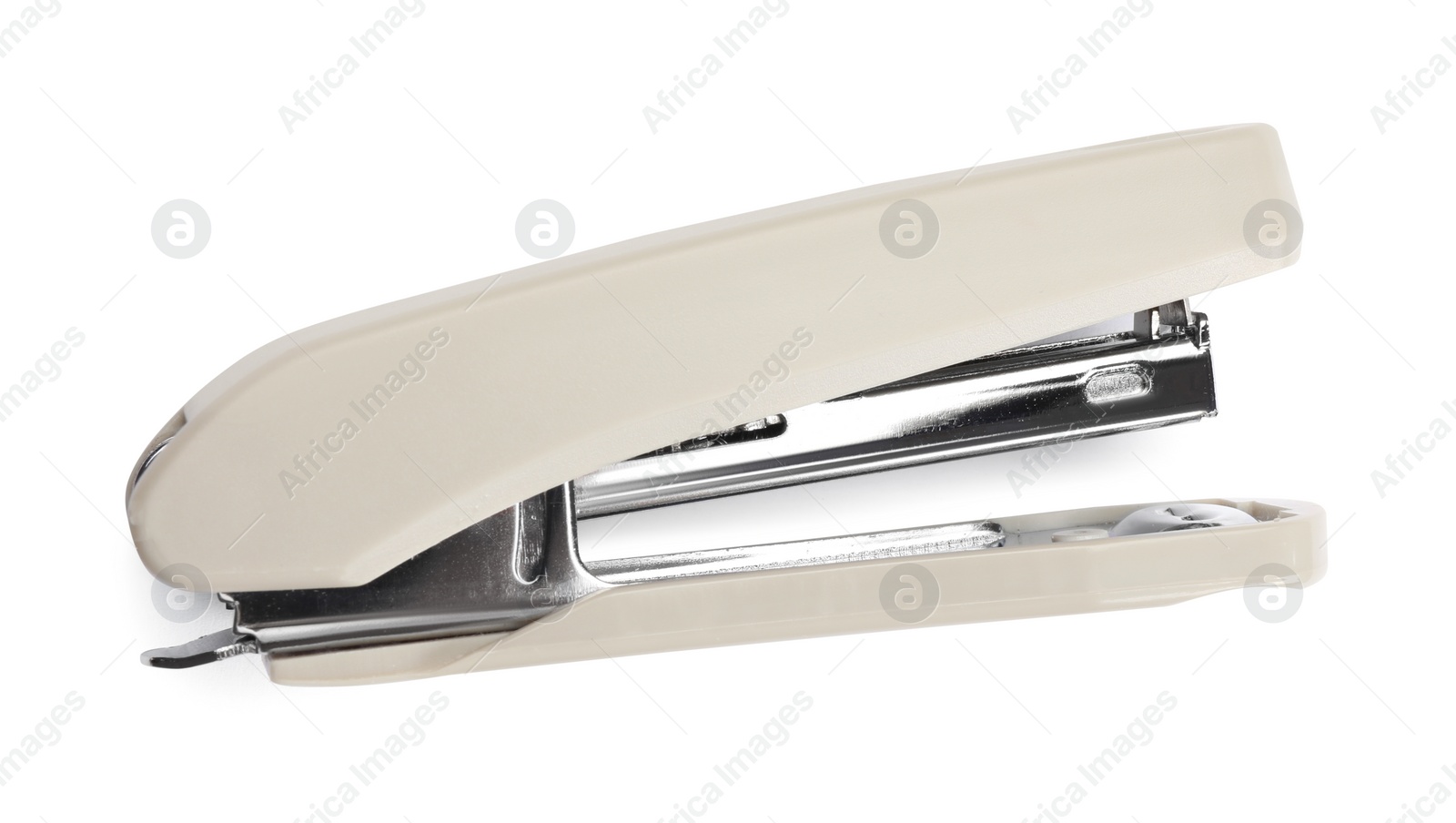 Photo of One beige stapler isolated on white, top view