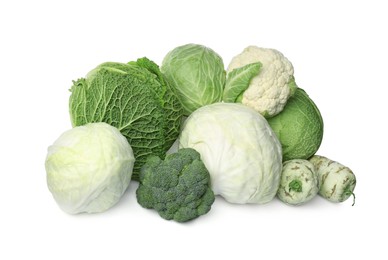 Many different fresh ripe cabbages on white background