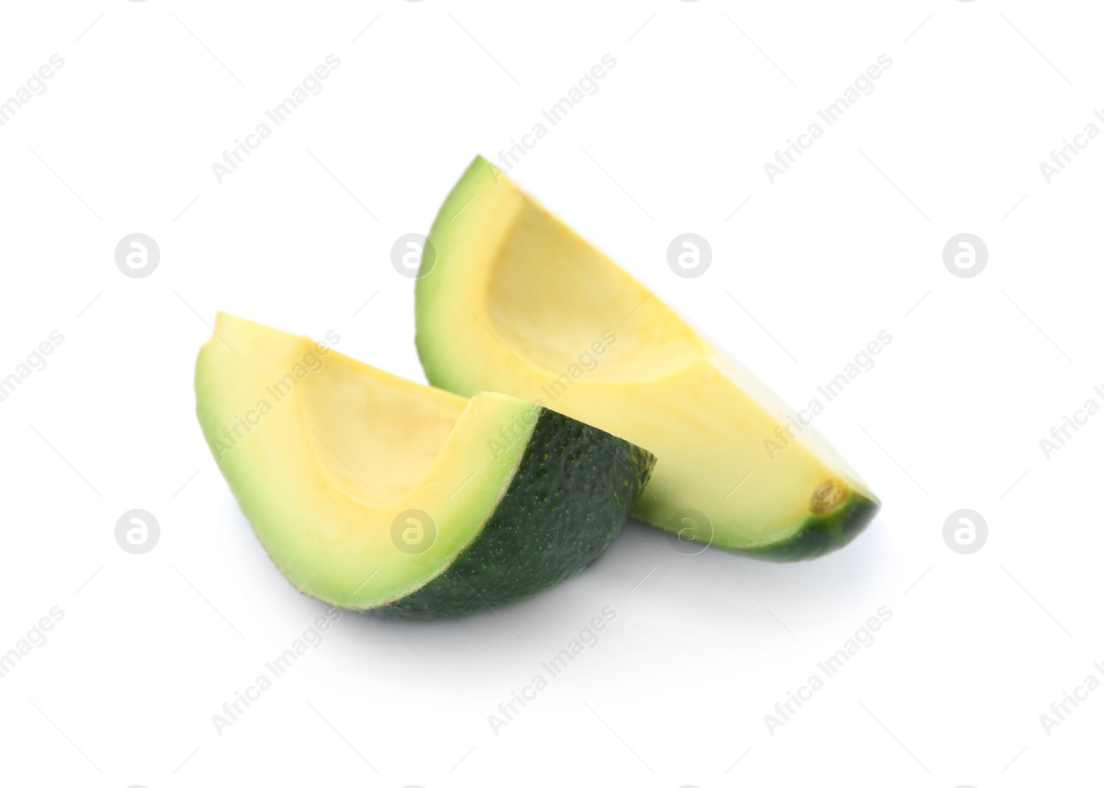 Photo of Slices of ripe avocado on white background