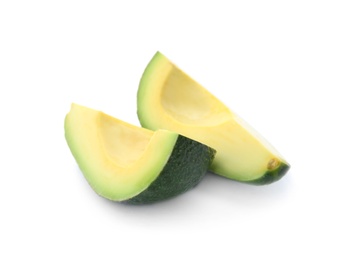 Photo of Slices of ripe avocado on white background