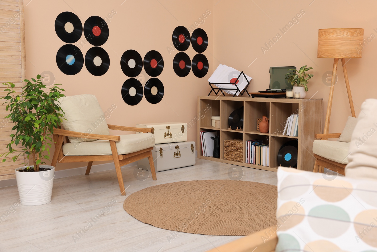 Photo of Living room interior decorated with vinyl records