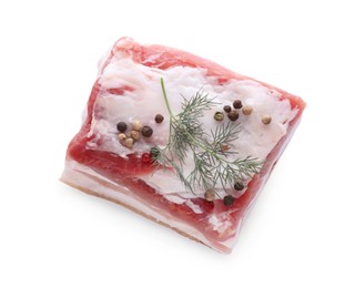Photo of Piece of pork fatback with dill and spices isolated on white, top view