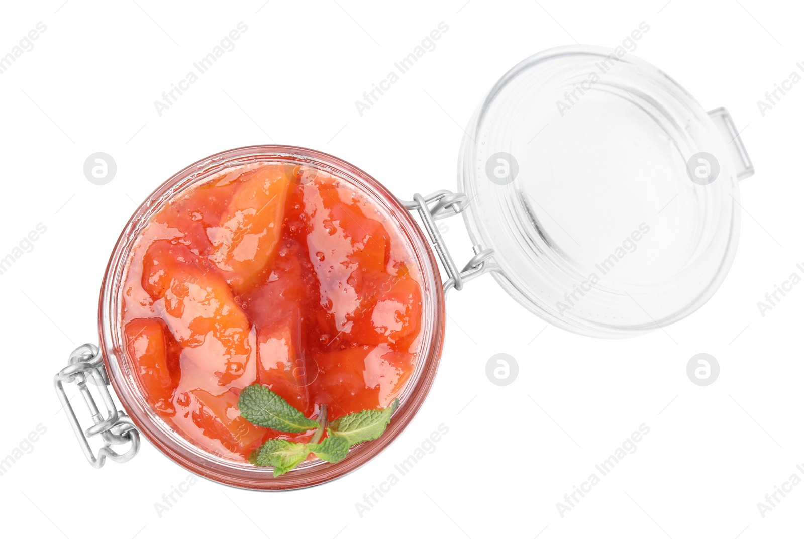 Photo of Jar of tasty persimmon jam isolated on white, top view