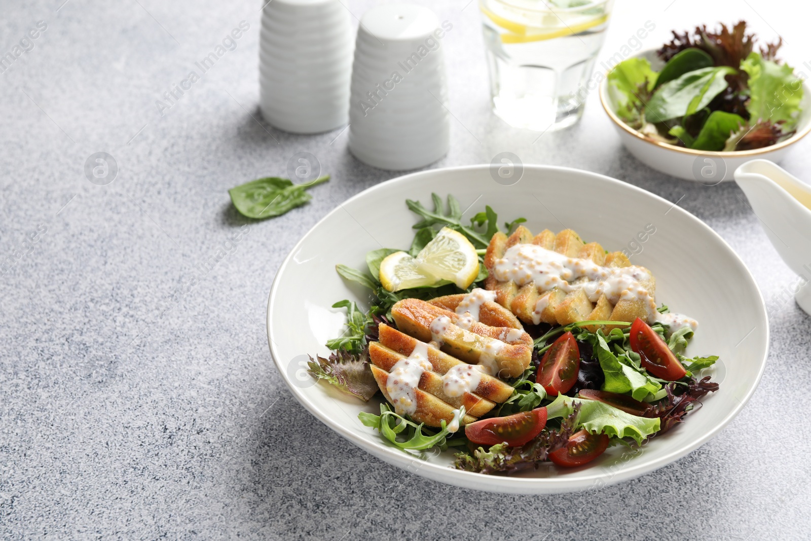 Photo of Healthy dish high in vegetable fats on light textured table, closeup. Space for text