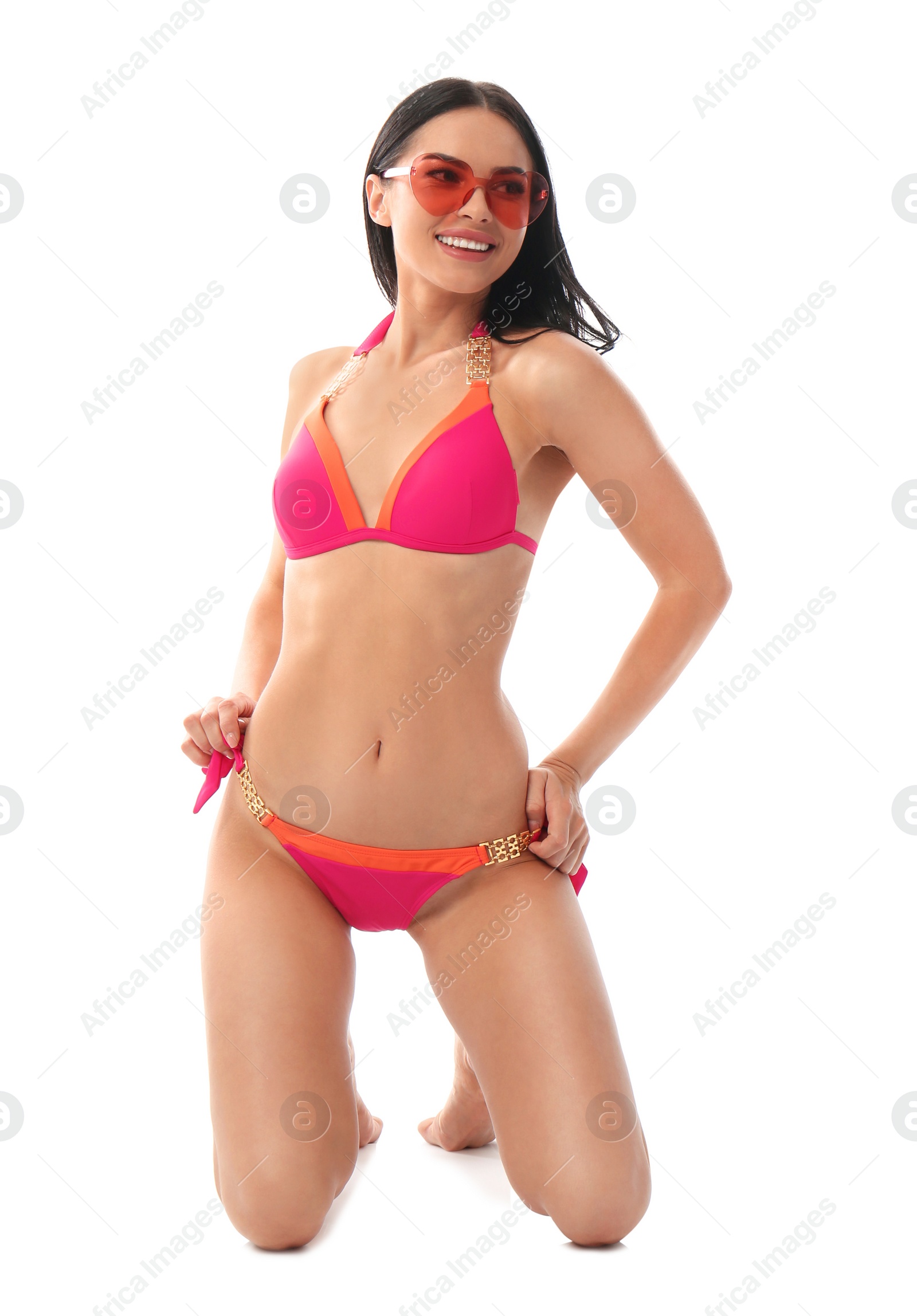 Photo of Beautiful young woman in stylish bikini with sunglasses on white background