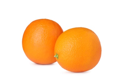 Fresh ripe oranges isolated on white. Citrus fruit