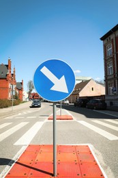 Traffic sign Keep Right on city street
