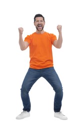 Emotional sports fan celebrating on white background