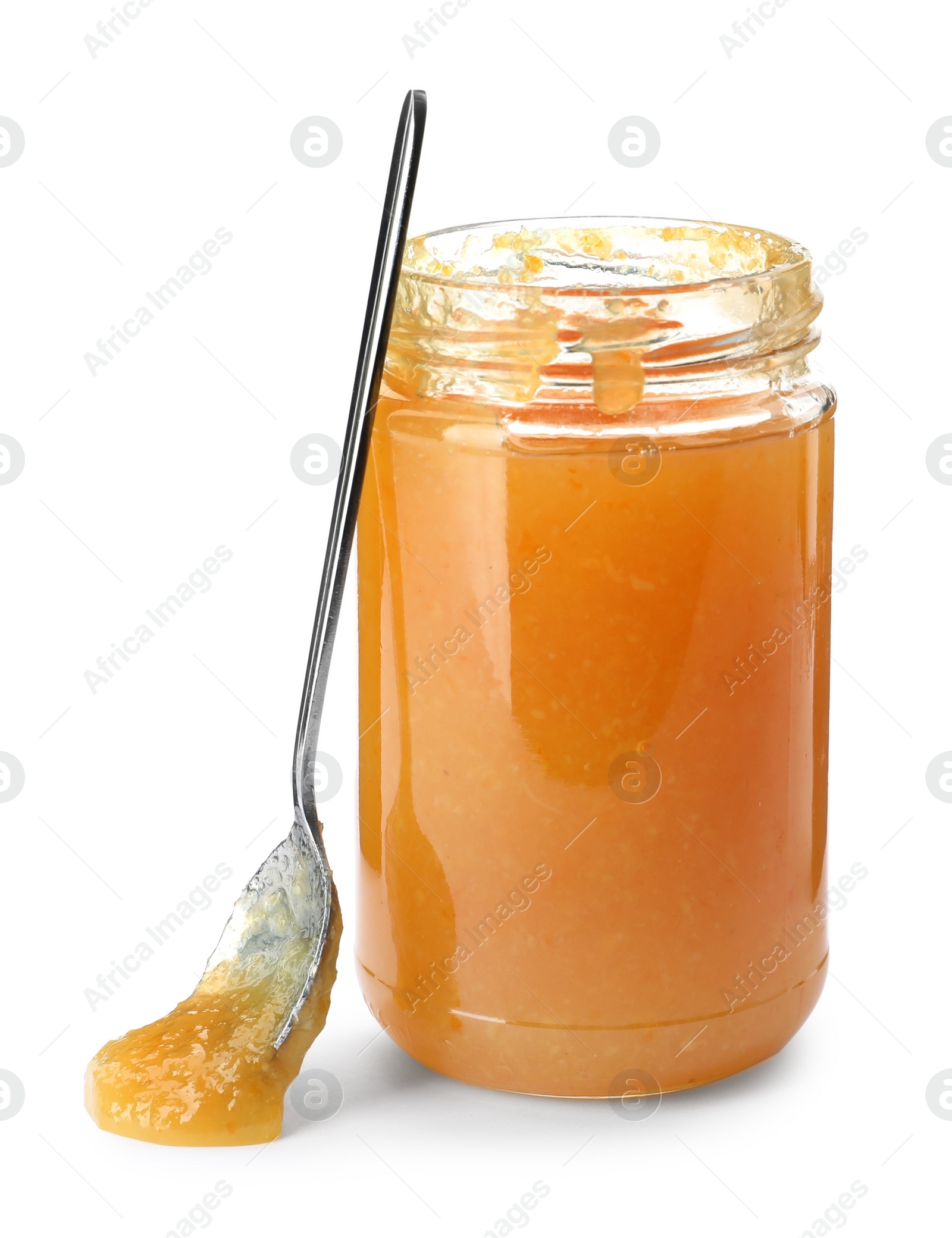 Photo of Jar of delicious orange marmalade with spoon on white background