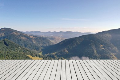 Image of Empty wooden surface and beautiful view of mountain landscape