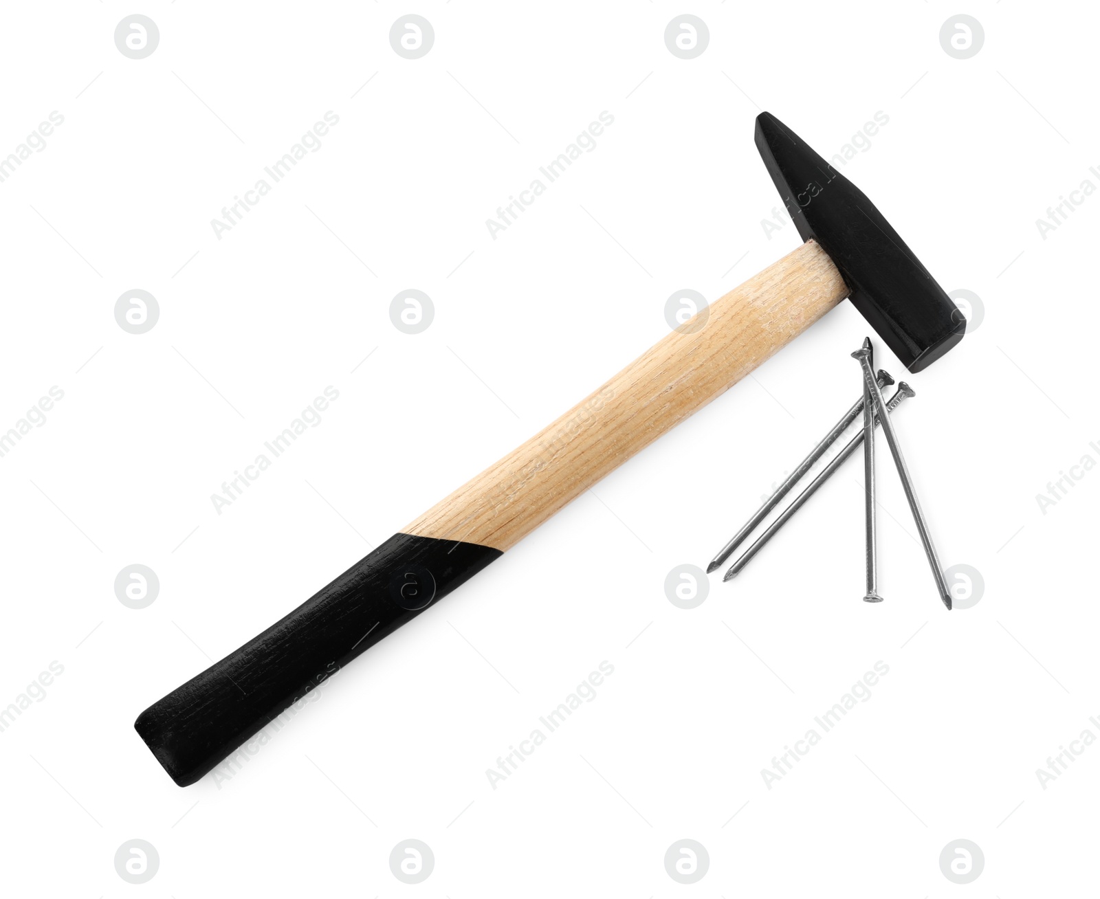 Photo of Hammer and metal nails on white background, top view