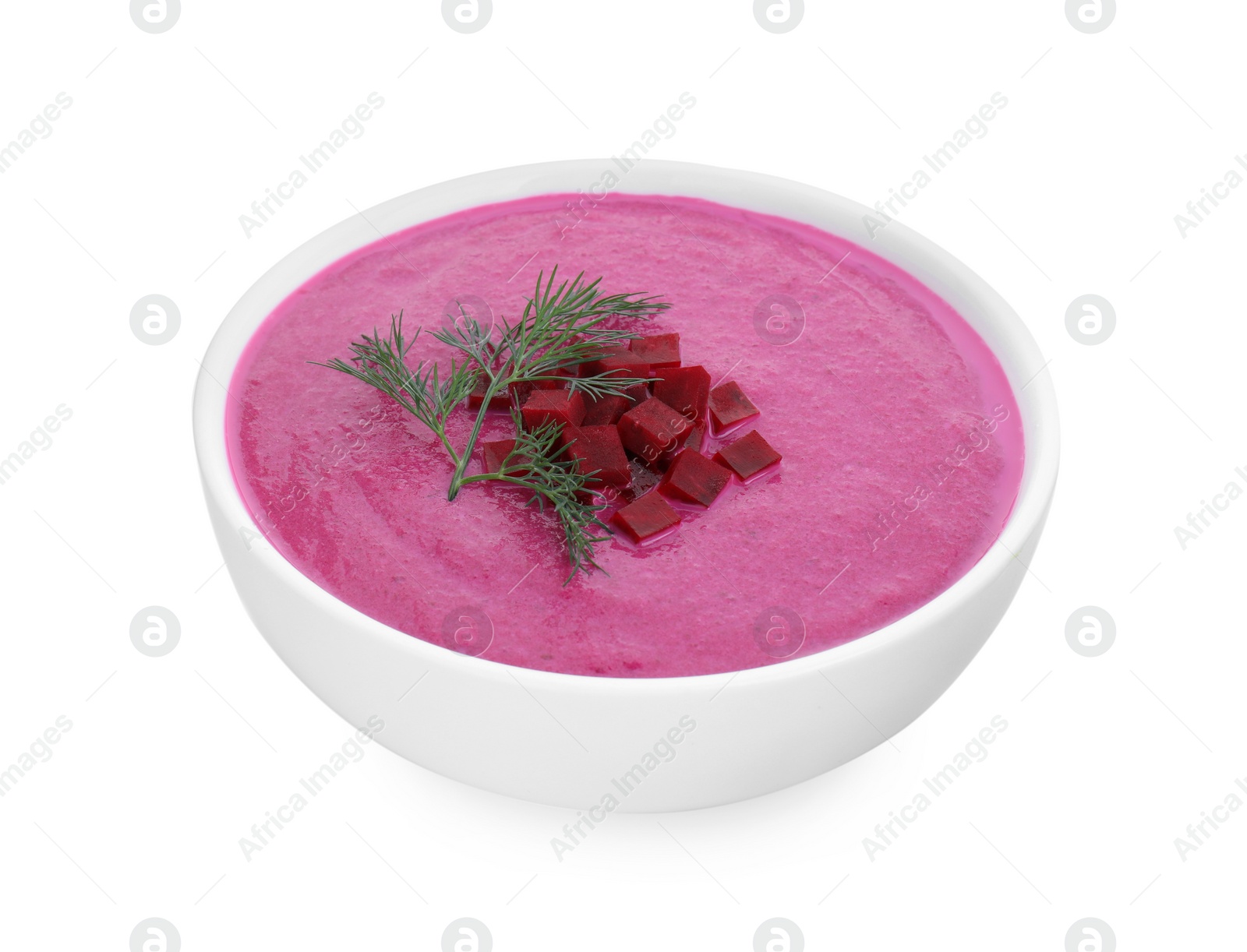 Photo of Delicious beetroot cream soup in bowl isolated on white