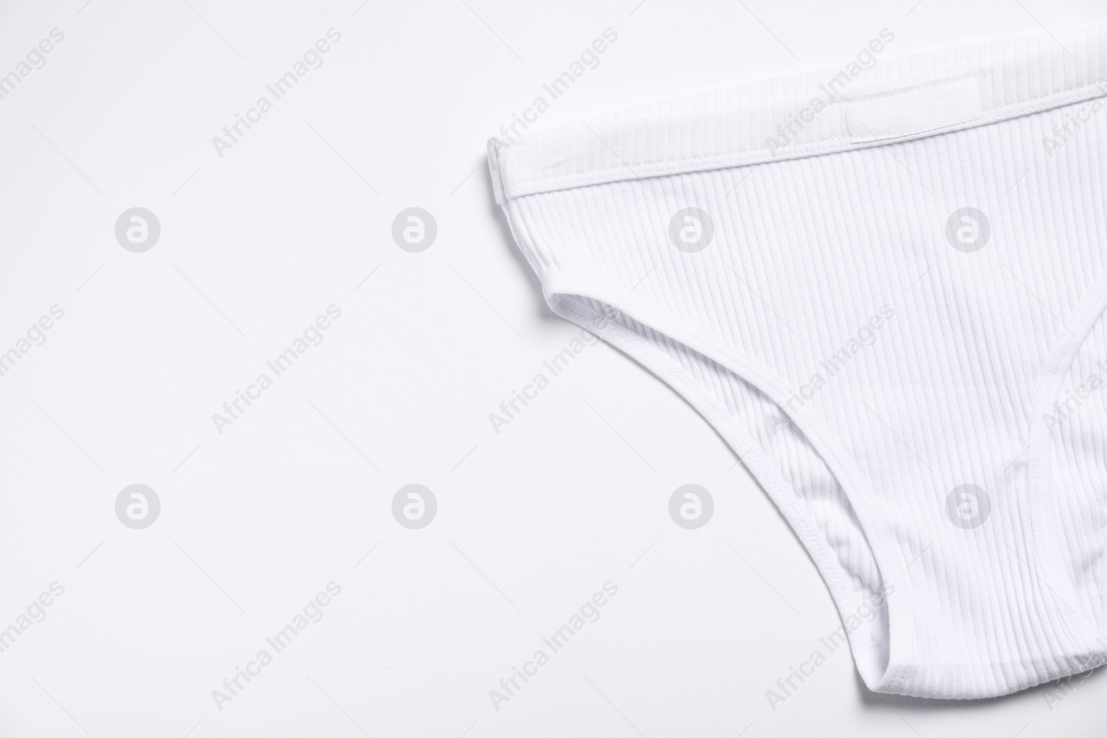 Photo of Stylish women's underwear on white background, top view. Space for text