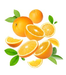 Image of Cut and whole oranges with green leaves flying on white background