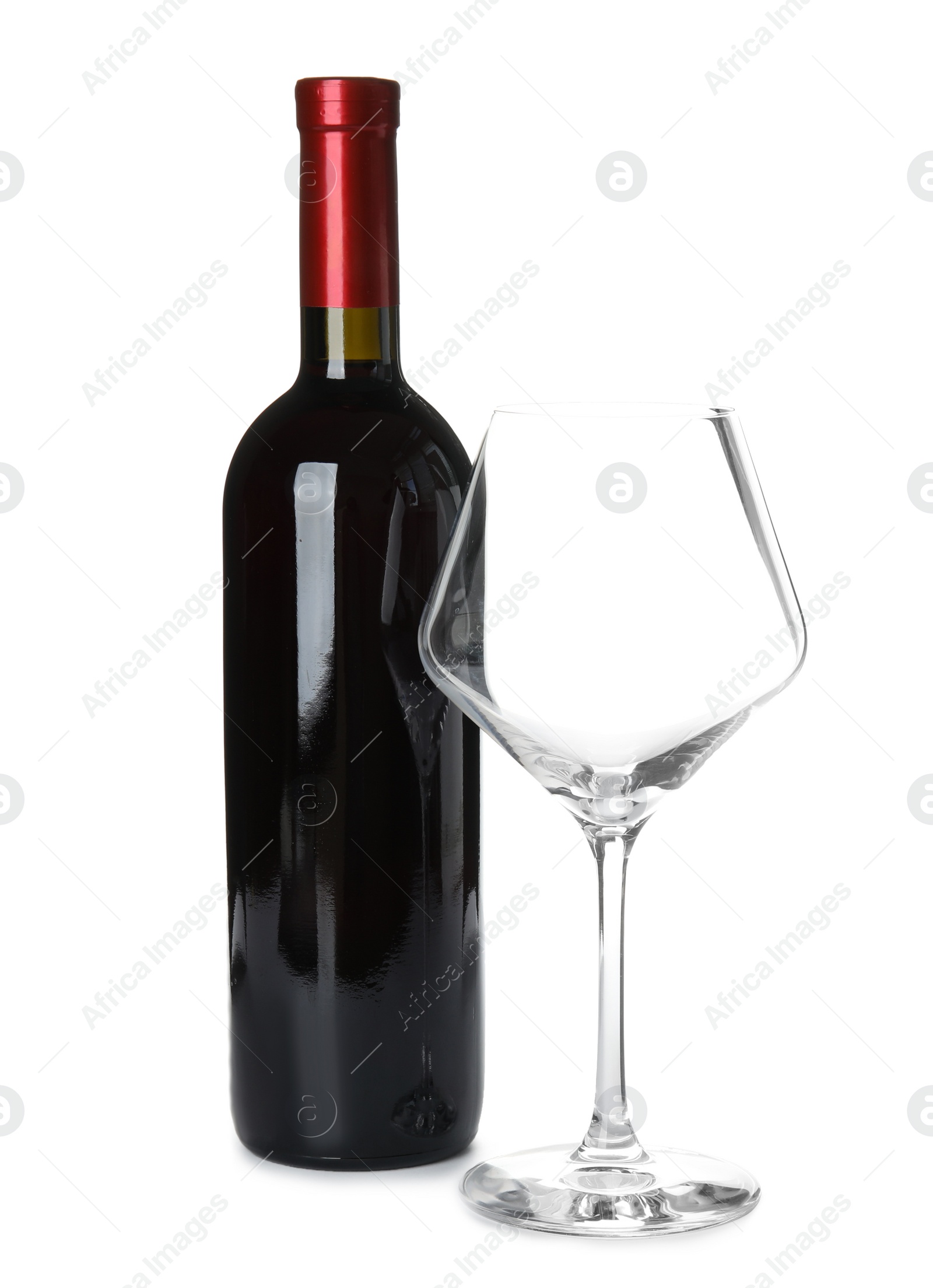 Photo of Bottle of red wine and glass on white background