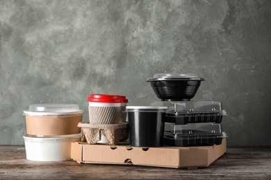 Photo of Various takeout containers on table. Food delivery service