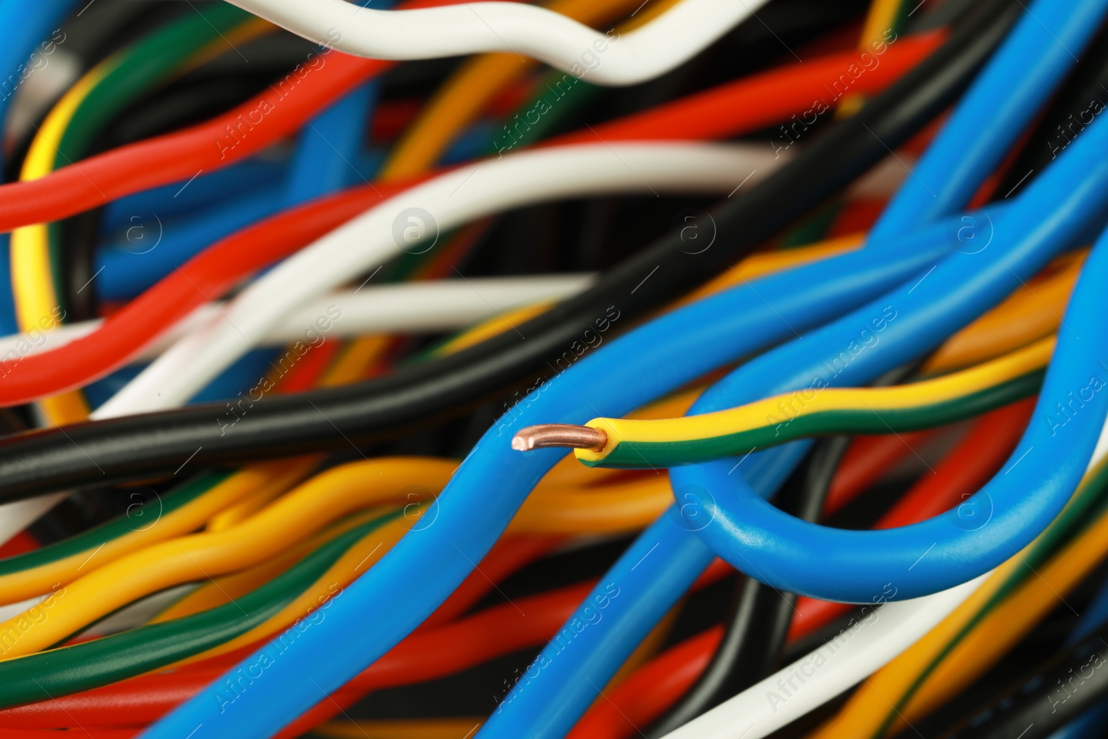 Photo of New colorful electrical wires as background, closeup