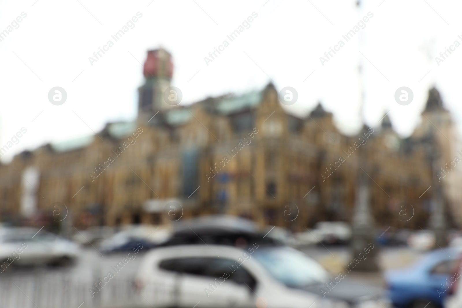 Photo of KYIV, UKRAINE - MAY 21, 2019: Blurred view of cityscape and street traffic