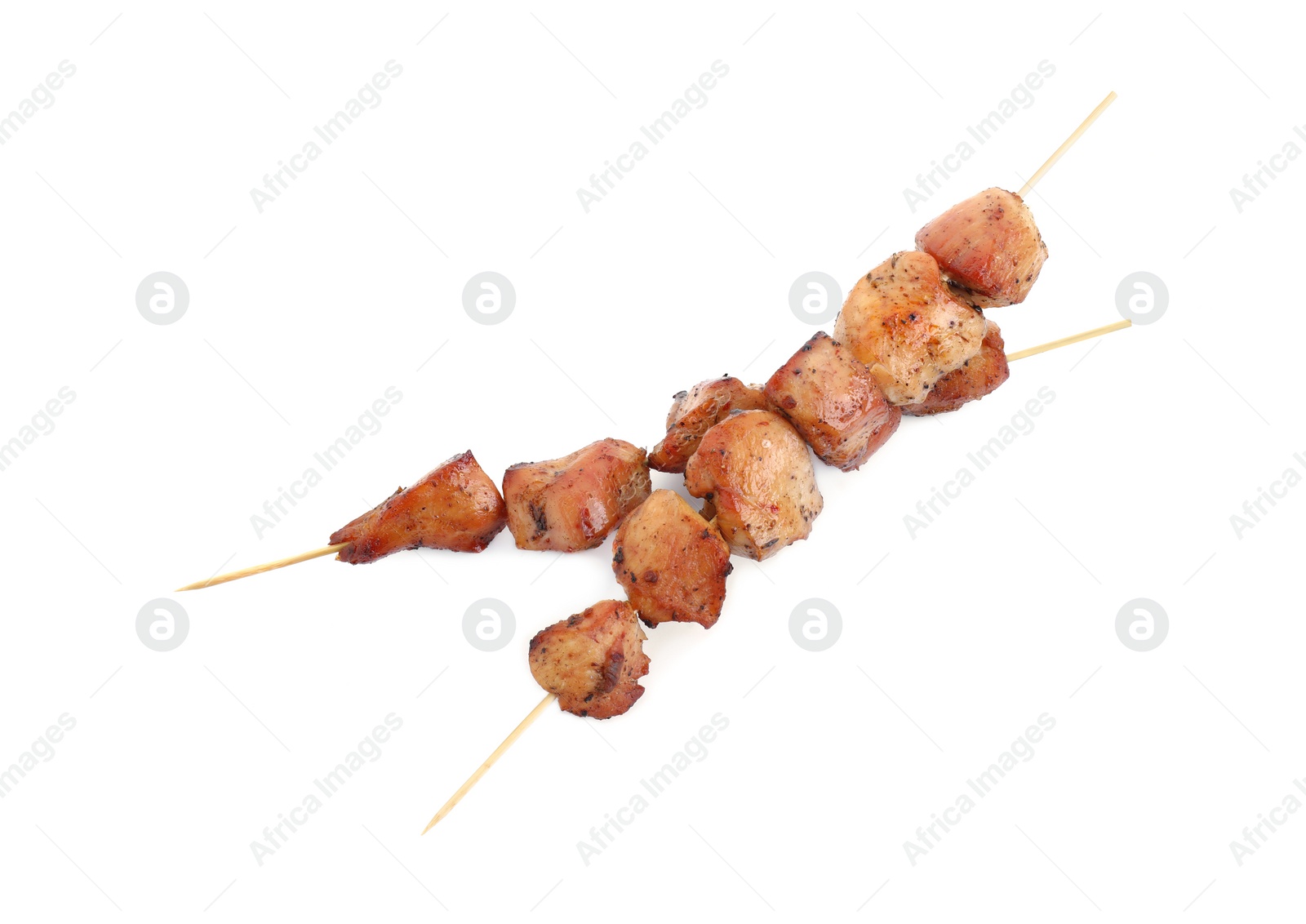 Photo of Delicious shish kebabs isolated on white, top view